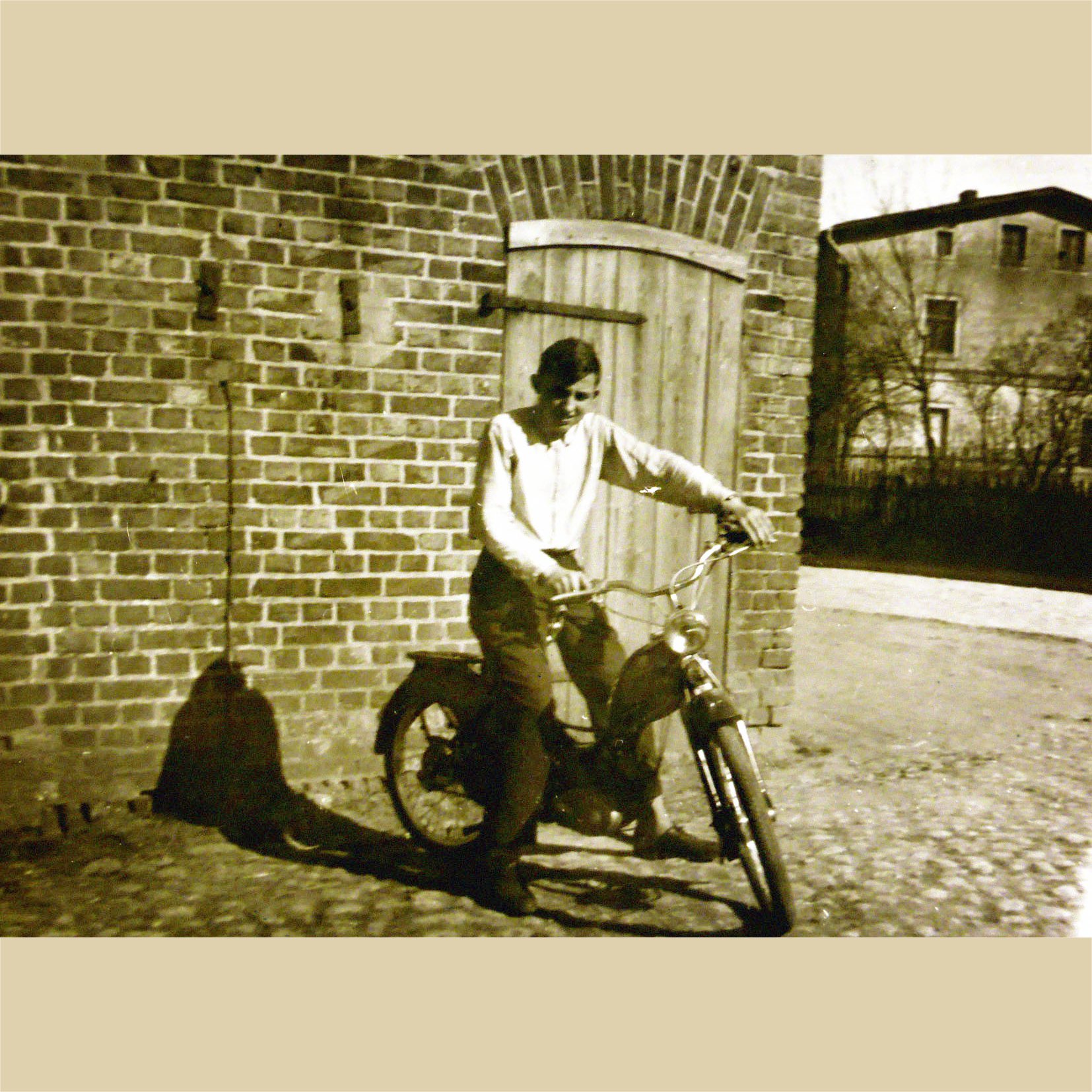 Home boy on moped at Stara Olejarnia
